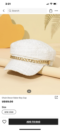 gold chain decorated white bakers boy hat