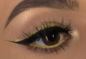 Yellow Glitter Winged Eye Makeup