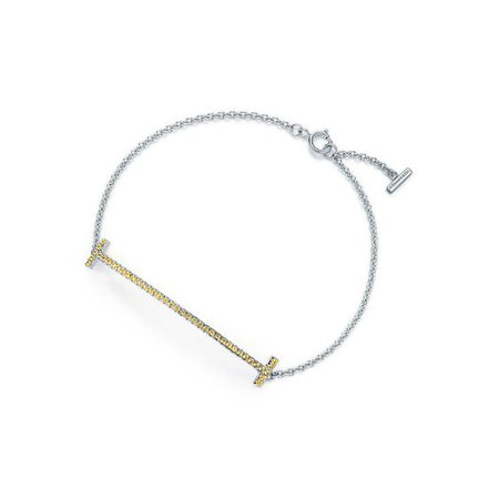 Tiffany T smile bracelet in 18k white gold with yellow sapphires, medium. | Tiffany & Co.