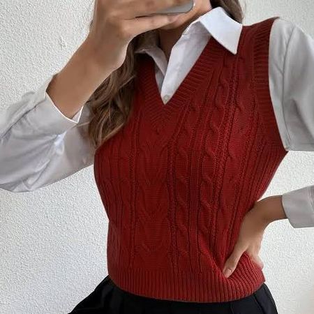 White button-up shirt with red sweater vest