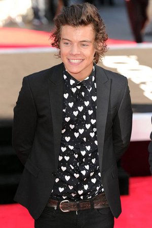 http://www.glamourmagazine.co.uk/gallery/harry-styles-style-file-fashion-and-outfits