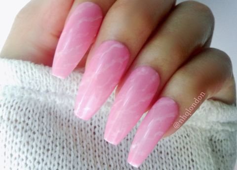 Pink coffin-shaped nails