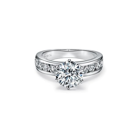 The Tiffany® Setting Engagement Ring with a Channel-set Diamond Band in Platinum