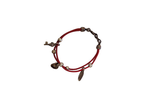 red bracelet with metal charms