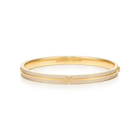 Tiffany T Two hinged bangle in 18k gold with pavé diamonds, medium. | Tiffany & Co.