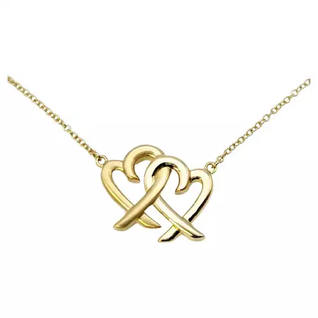 Tiffany and Co. Paloma Picasso Interlocking Hearts Pendant Necklace 18 Karat Gold For Sale at 1stDibs | tiffany and co double heart necklace gold, gold heart necklace tiffany, 2 heart necklace gold