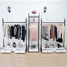 Hanging Clothes Rack for Stores - Bing images