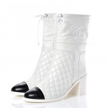 CHANEL Distressed Patent Quilted Cap Toe Short Boots