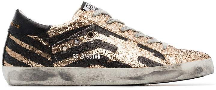 black and metallic gold superstar leather sneakers