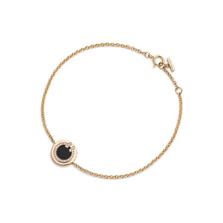 Tiffany T diamond and black onyx circle bracelet in 18k gold, medium-large. | Tiffany & Co.