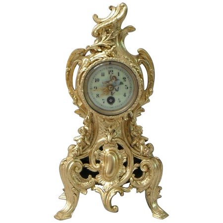 French Rococo Style Gilt Metal Mantel Clock For Sale at 1stdibs