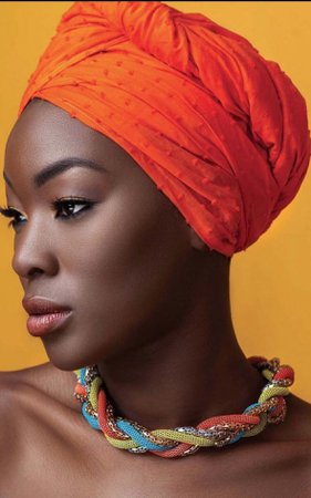 radiant black beautiful African woman lighting mood head scarf