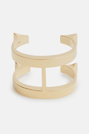 Carolina Herrera, Gold Insignia cuff bracelet