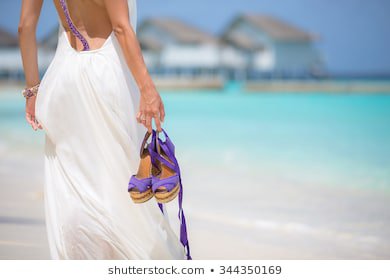 model holding sandals beach - Google Search