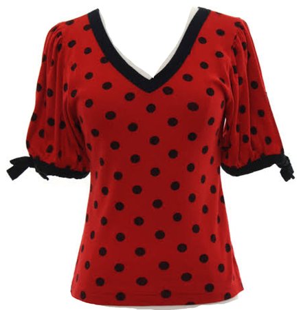red blouse with black polka dots
