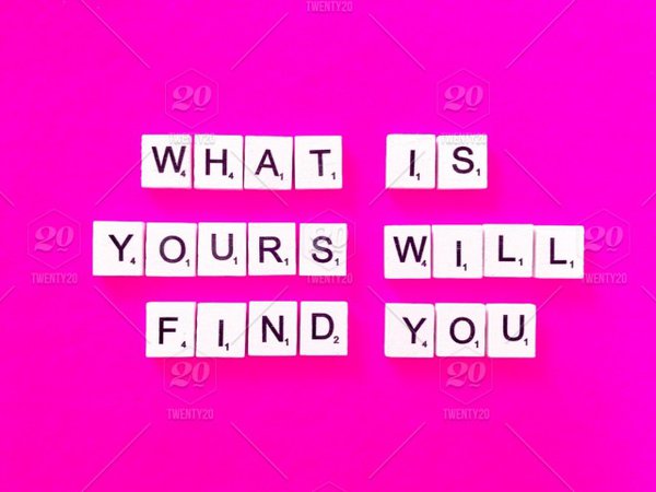 What is yours will find you. Scrabble. Scrabbles. Sayings and quotes. Stay positive. Hopeful message. stock photo dfc111ff-9d1e-43c2-bbea-01c28b34c22d