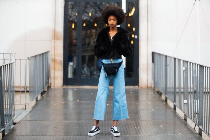 With a Cropped Fur Jacket, Fanny Pack, and Flared Jeans | How to Wear Vans Sneakers | POPSUGAR Fashion Photo 27