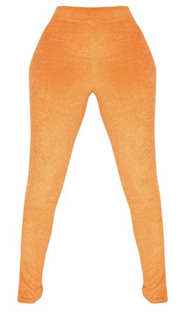 Orange fuzzy leggings