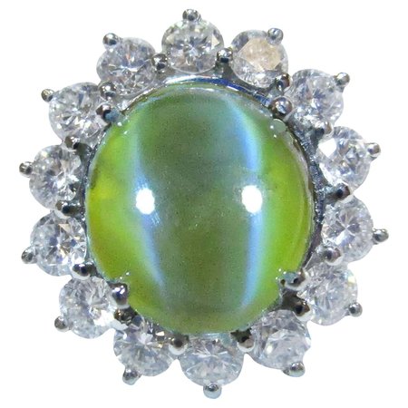 GIA Certified 7+ Carat Cat's Eye Chrysoberyl Platinum Diamond Ring For Sale at 1stDibs