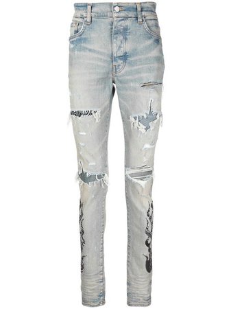 AMIRI paisley-print ripped skinny jeans - FARFETCH