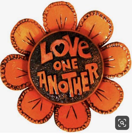 “love one another” orange flower pin