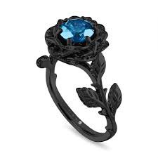 black and light blue flower ring