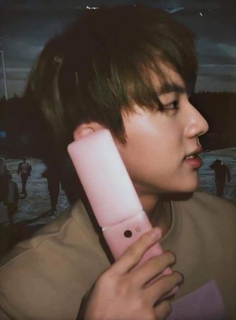 jin and his pink flip phone