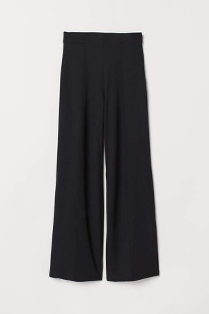 Wide trousers with creases - Black