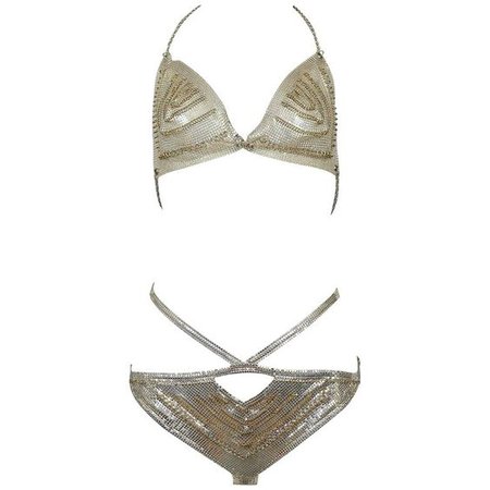 "Metal Couturier" Paco Rabanne silver chain mail metal two piece bikini with gold tone metal hoop detailing.