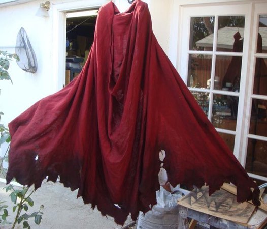 tattered red cape