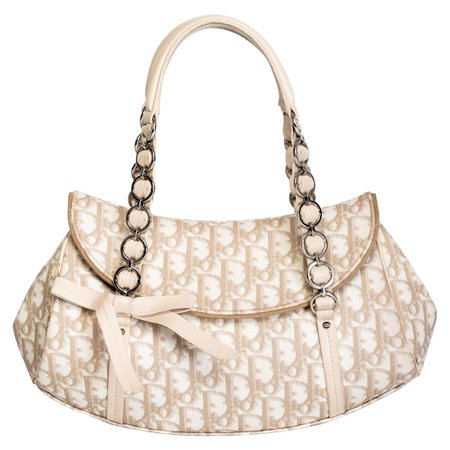 https://www.1stdibs.com/fashion/handbags-purses-bags/shoulder-bags/dior-vintage-romantique-trotter-monogram-2007/id-v_12347572/ - بحث Google‏