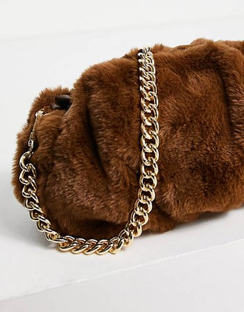 ASOS DESIGN oversized ruched clutch bag in brown faux fur with detachable shoulder chain | ASOS