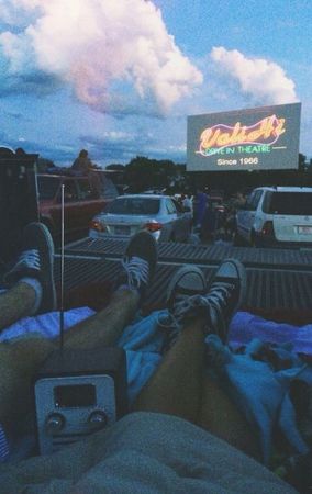 drive in movie theater friends couple