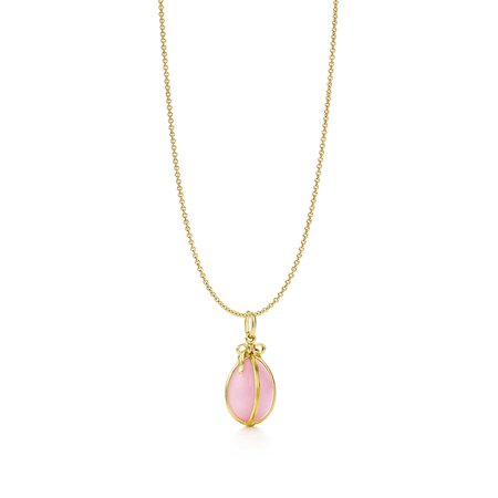 Jean Schlumberger Egg charm with pink opal in 18k gold on a Schlumberger chain. | Tiffany & Co.