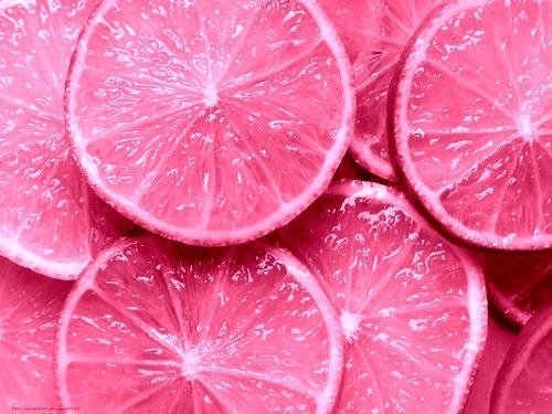 Juicy Pink Fruit Slices Background