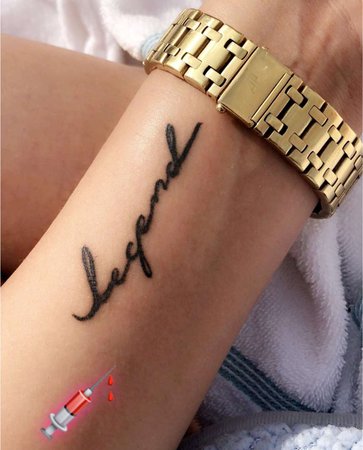 “legend” wrist tattoo