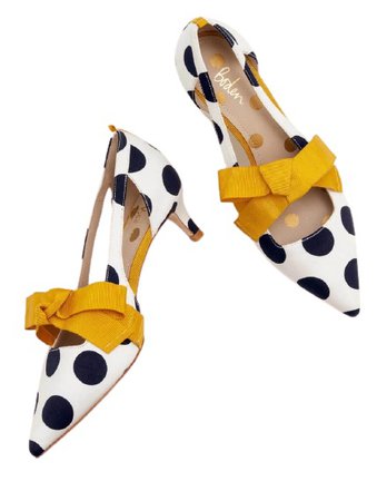 black and white books dot heels with yellow bow