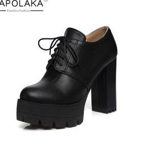 Black heeled platform boots