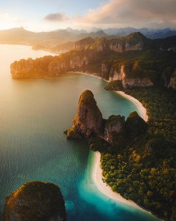 Elliott | Adventure + Travel on Instagram: “A few weeks ago I took a random fishing boat and sailed to Railay Beach, Thailand for sunset 🌄 It was a bit cloudy, but as I put the drone…”