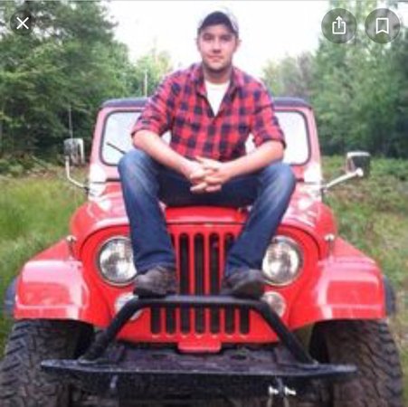 guy in red Jeep