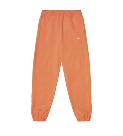 orange Nike sweatpants