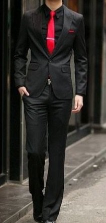 black suit with red tie