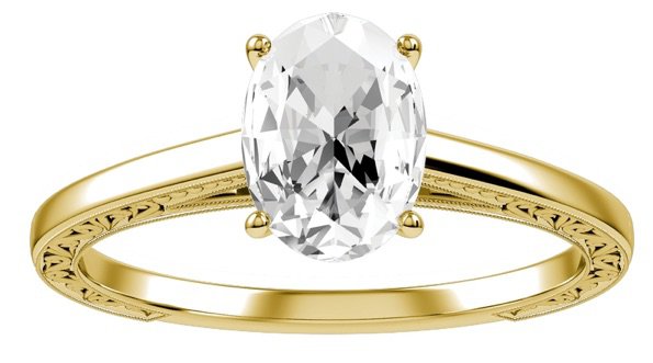 4 Prongs Solitaire Diamond Bridal Ring in 10K Yellow Gold With Three-Quarters Scroll Carving on the band Shown with a 3/4 Carat Oval Diamond 3369.92$ USD