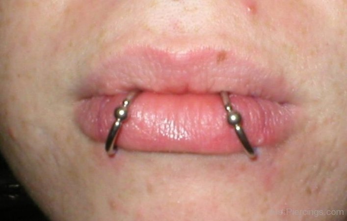 lip ring snakebites piercing