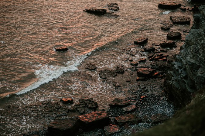 brown rocky shore during daytime photo – Free Wales Image on Unsplash