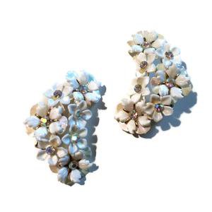 Sparkling Rhinestone Centered White Plastic Flower Ear Climber circa 1 – Dorothea's Closet Vintage
