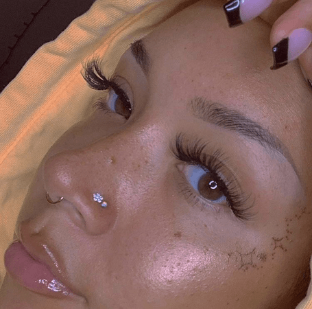 lashes + nose piercing
