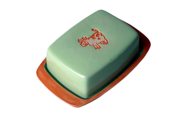 Green ceramic butter dish with orange cow