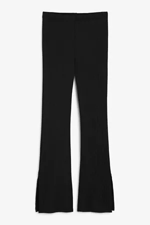 Ribbed flared trousers - Black - Trousers - Monki WW