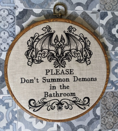 Please don't summon demons in the bathroom. Machine embroidery 8" hoop. Gothic décor, bathroom décor, Halloween décor, bathroom sign